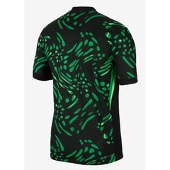 Nigeria 2025 home jersey in black with a scattered green leaf print and the Nigeria Football Federation crest.